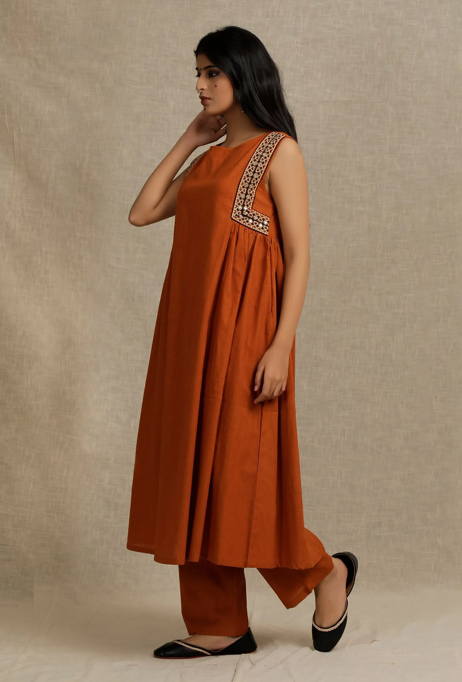 Orange Rust side Gather Kurta with Embroidery Details