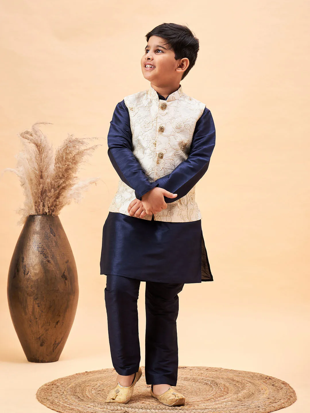 VASTRAMAY Boy's Beige Woven Nehru Jacket With Navy Blue Kurta Pyjama Set